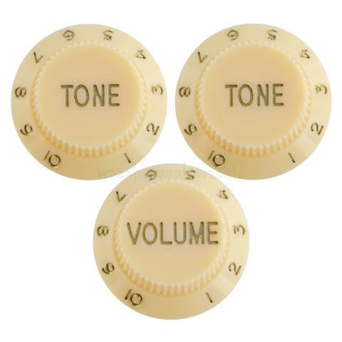 Set de 3 boutons crème et or